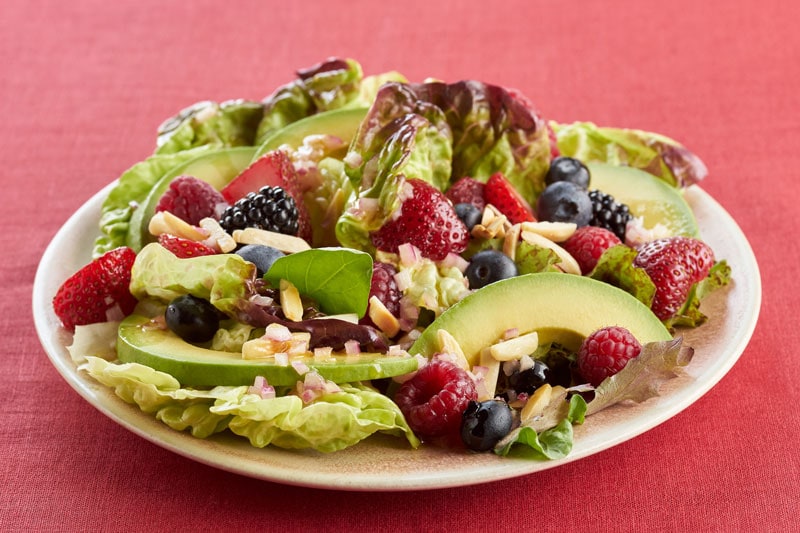 Kombucha berry salad with avocados