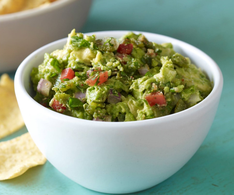 peel avocado and mash guacamole