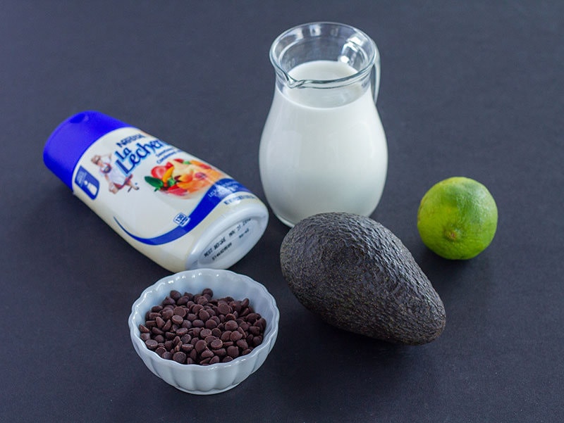 Ingredients for an avocado milkshake laid out
