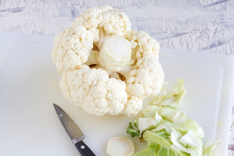 Trimming-of-leaves-and-stem-of-cauliflower.jpg