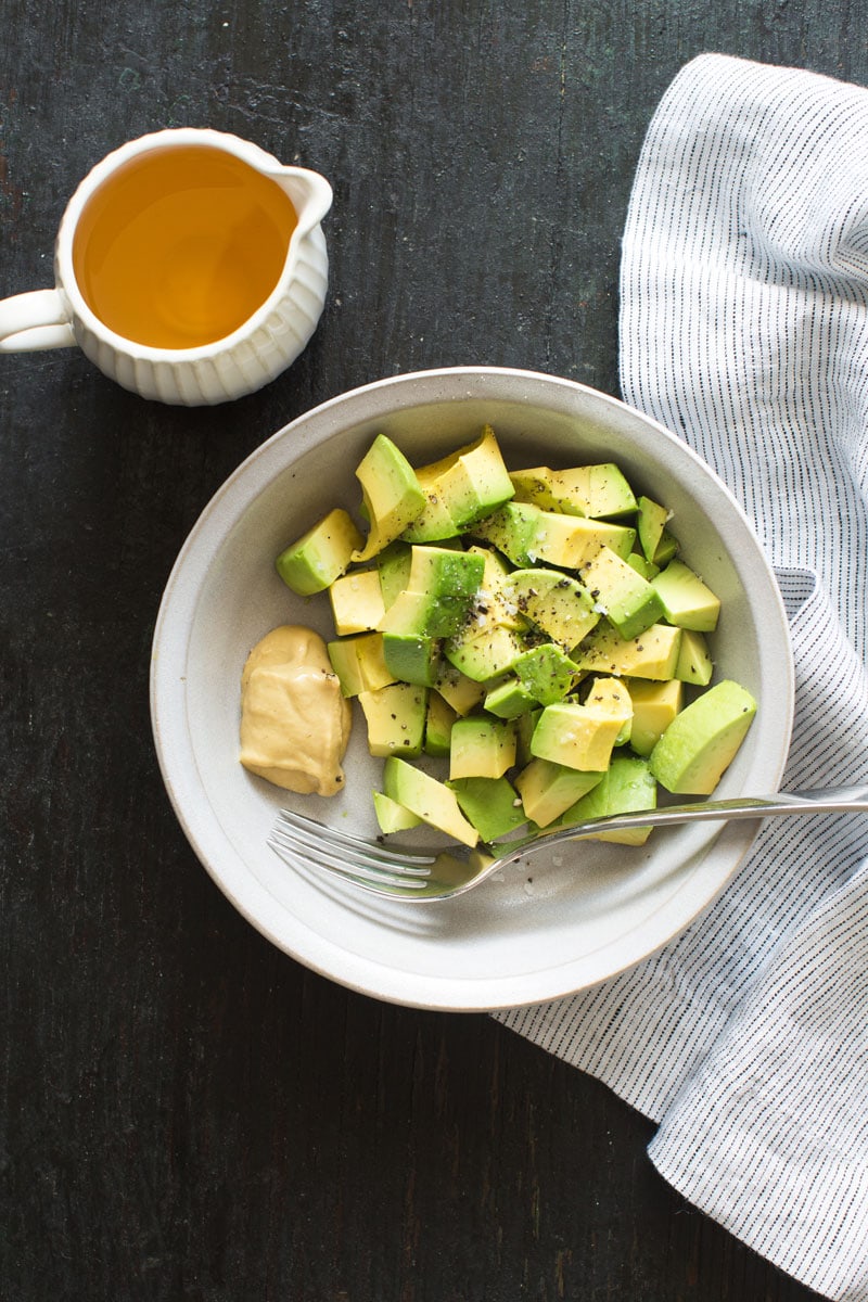 Cubed avocados with mustard and seasonings