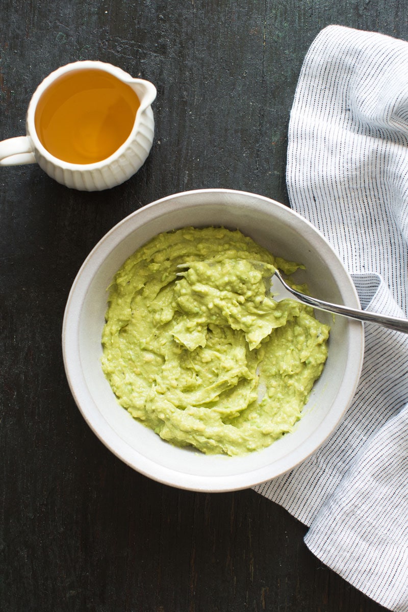 Mashed avocados in a bowl